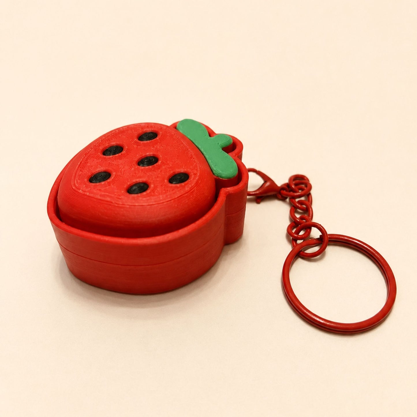 Porte-clés Clicker Fraise Sensorielle