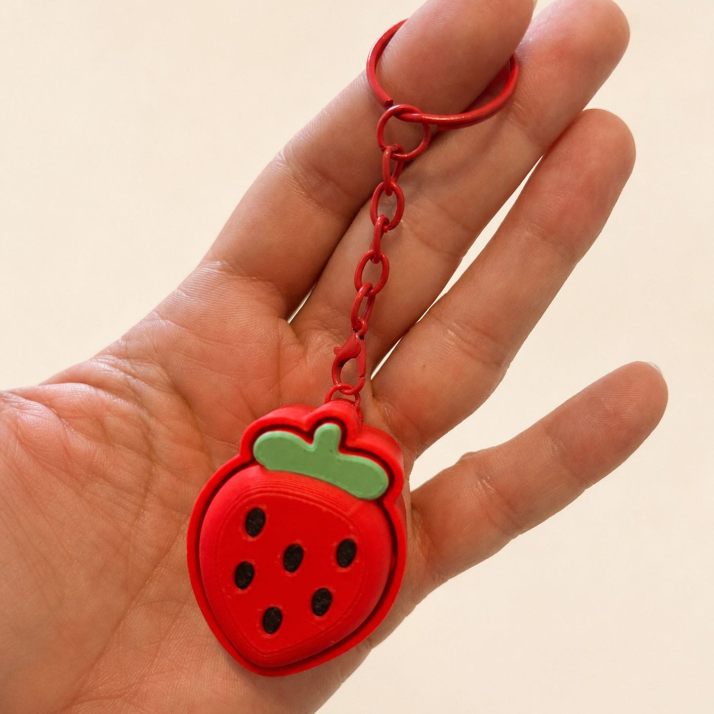 Porte-clés Clicker Fraise Sensorielle